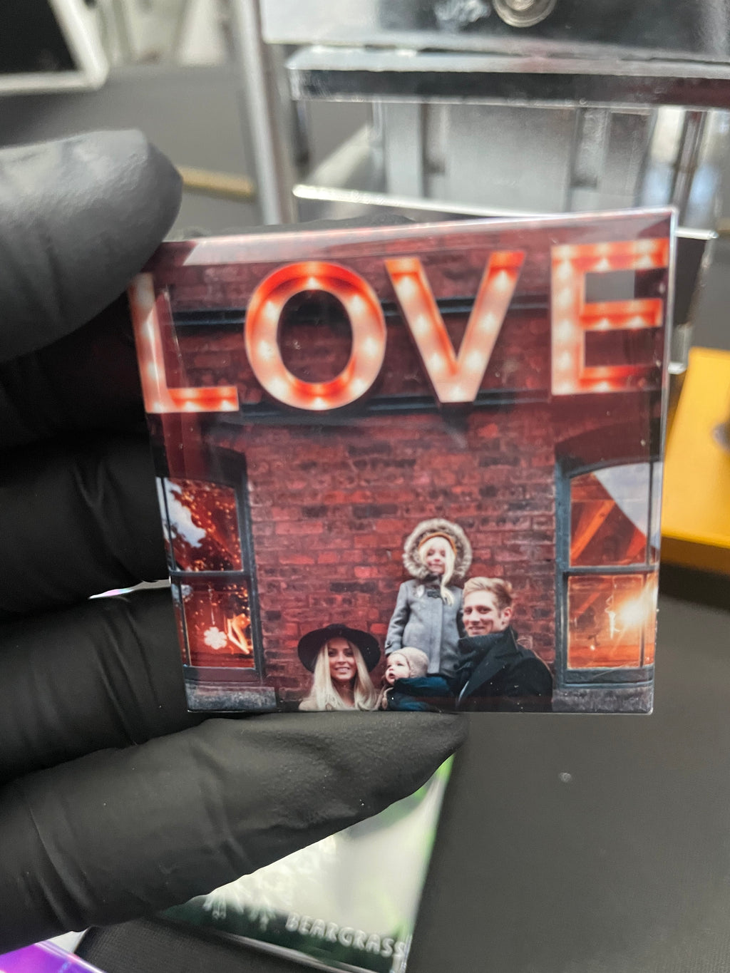 Square magnet with family and the word love 